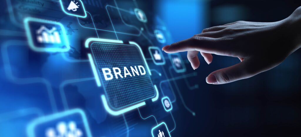 A finger pointing to a brand word.