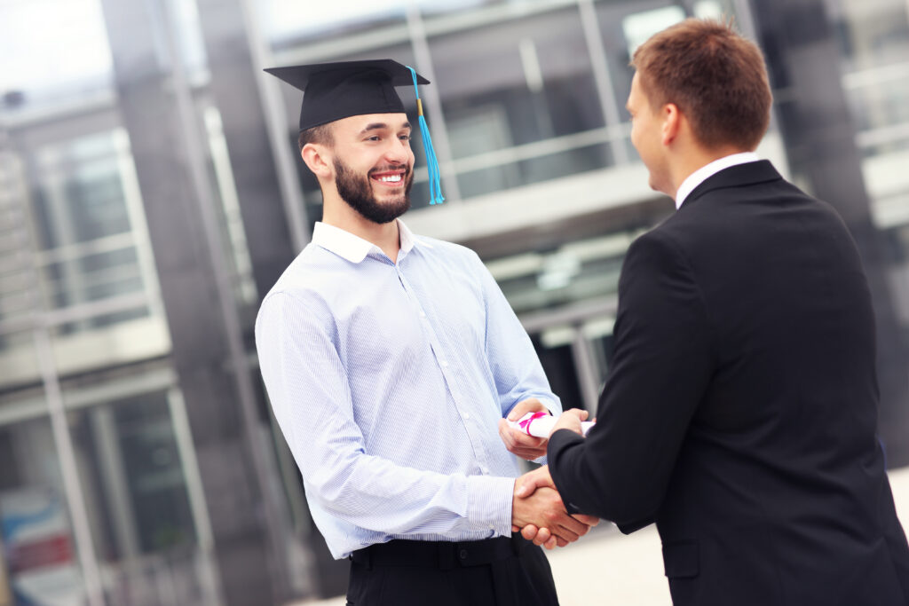 A new grad hired for a sales and marketing job.